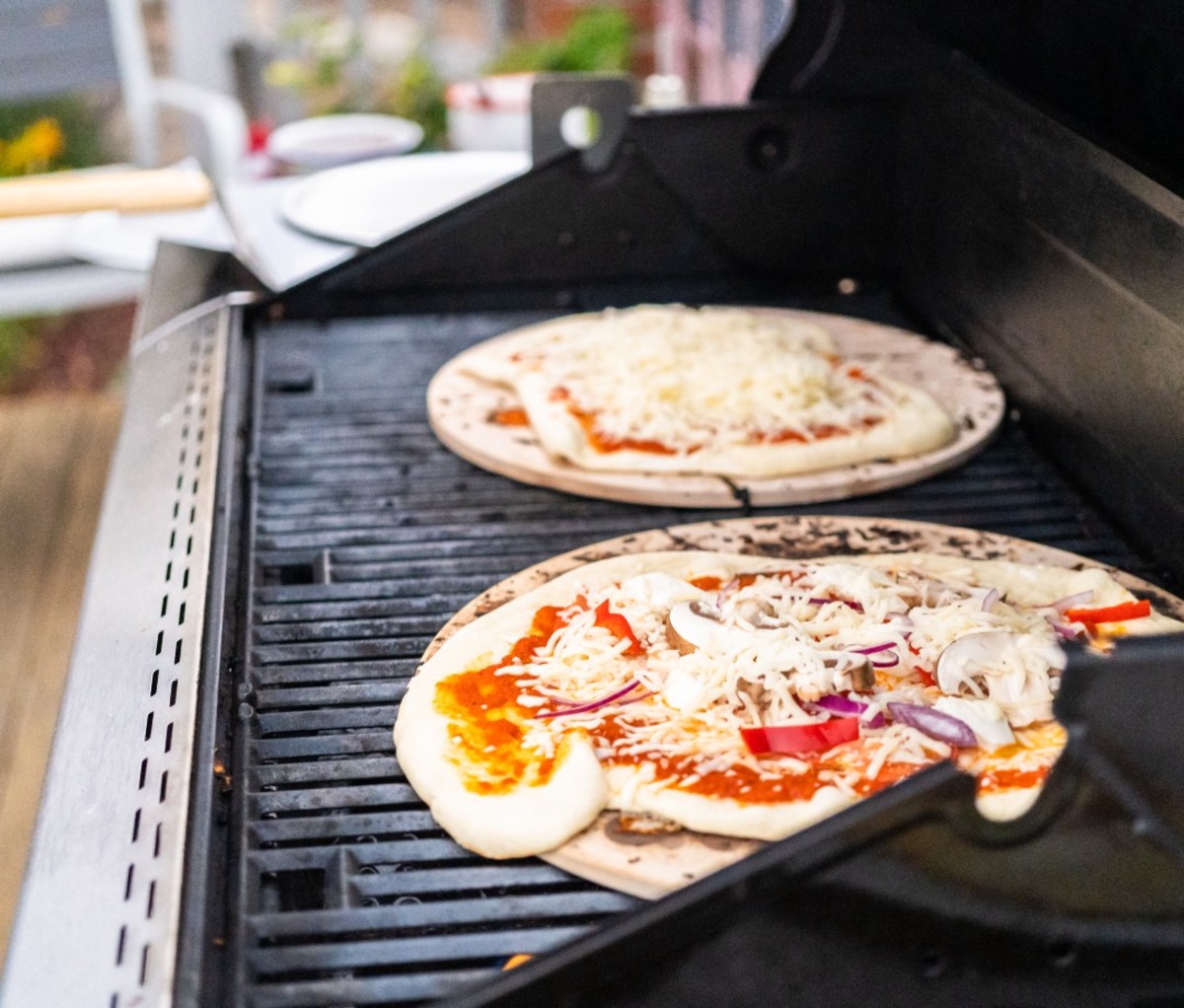 Pizzas on a grill