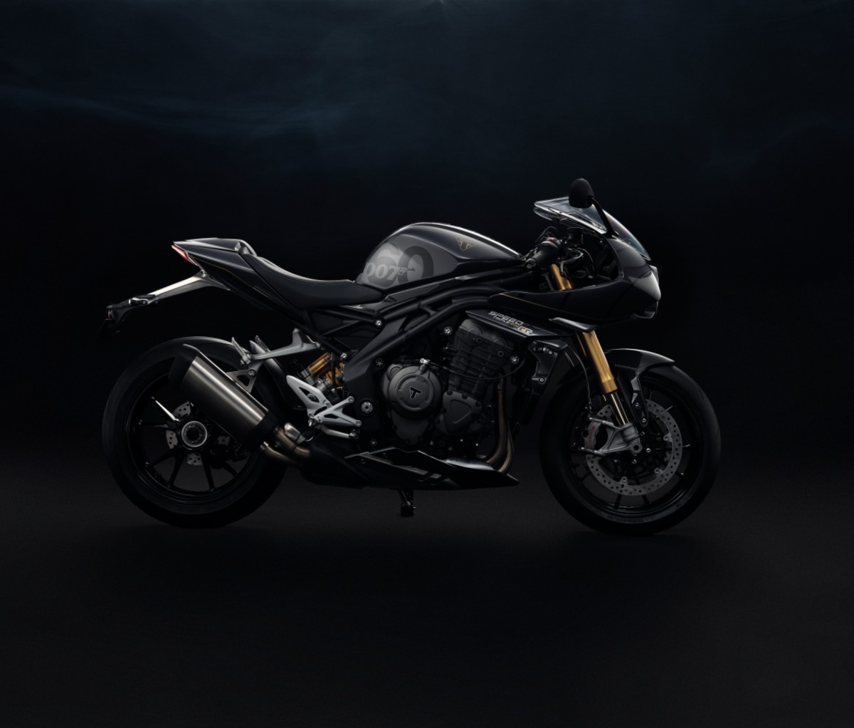 Triumph Speed Triple 1200 RR Bond Edition on a black background.