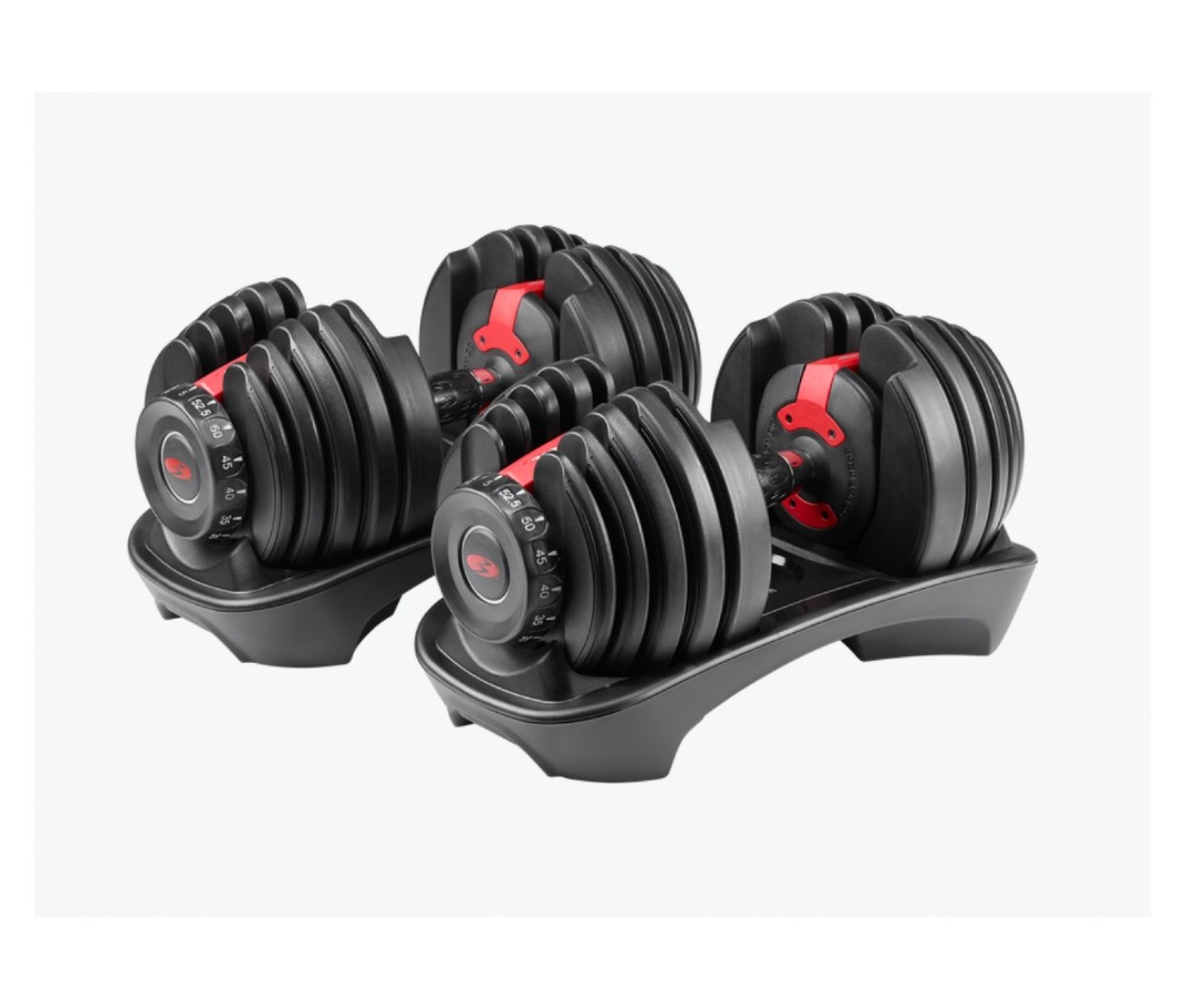 Red and black adjustable dumbbell set on a white background.