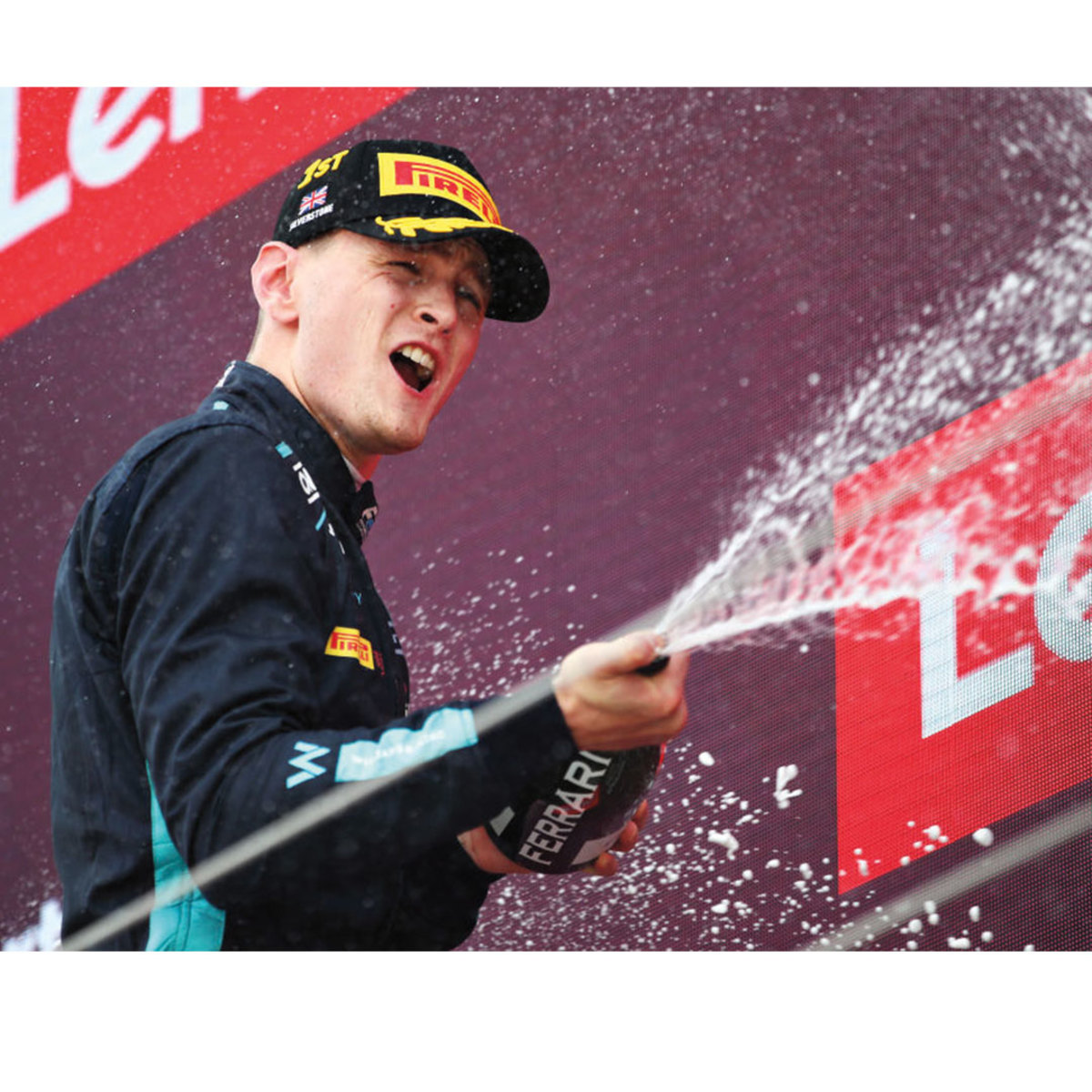 Race car driver spraying Champagne