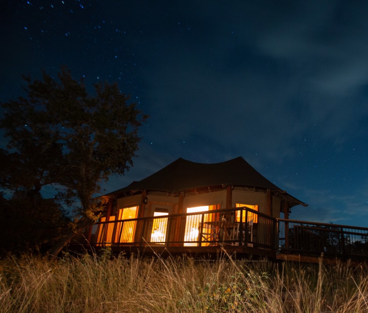 Wood ranch lit up at nighttime