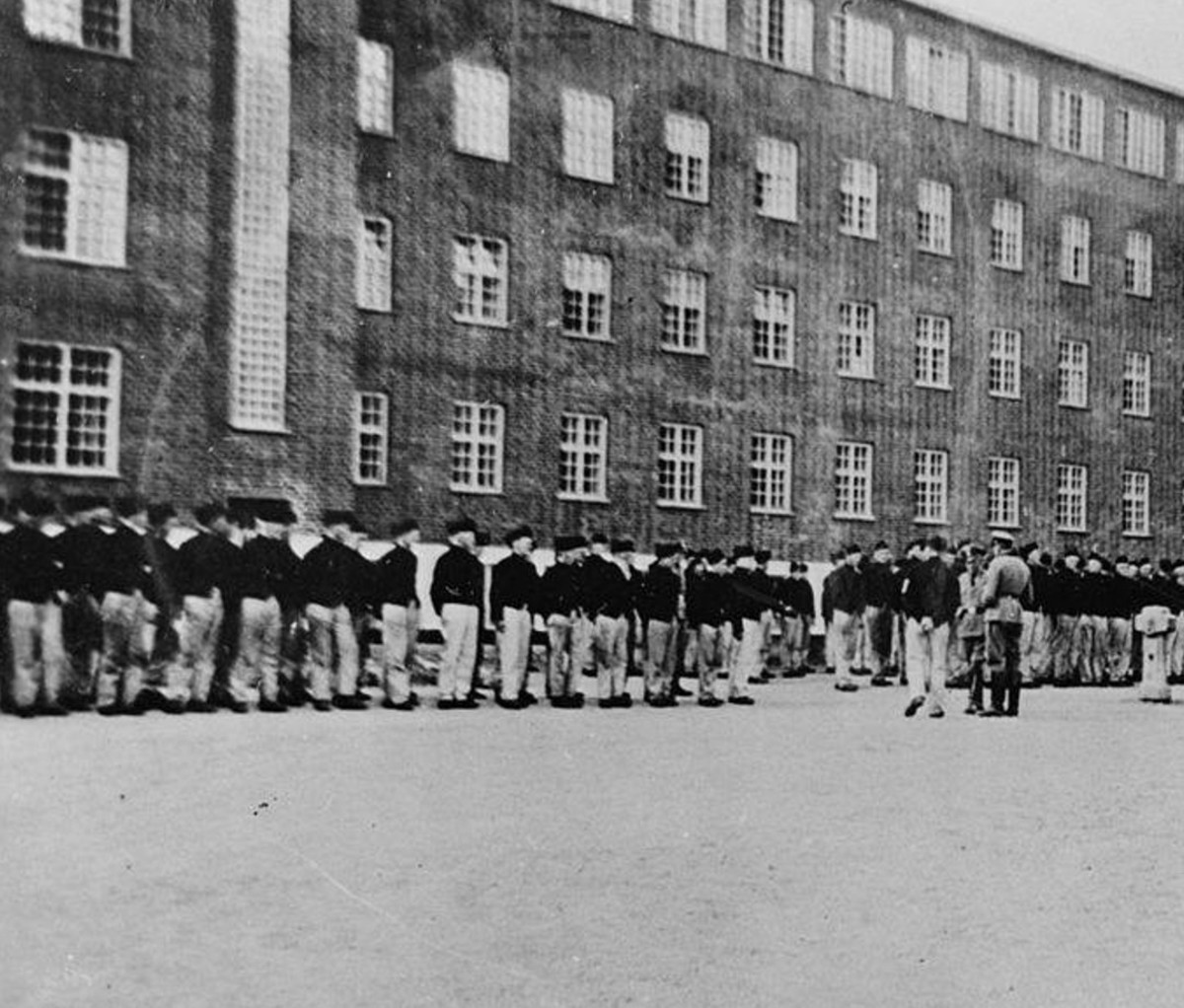 Concentration camp with men lined up