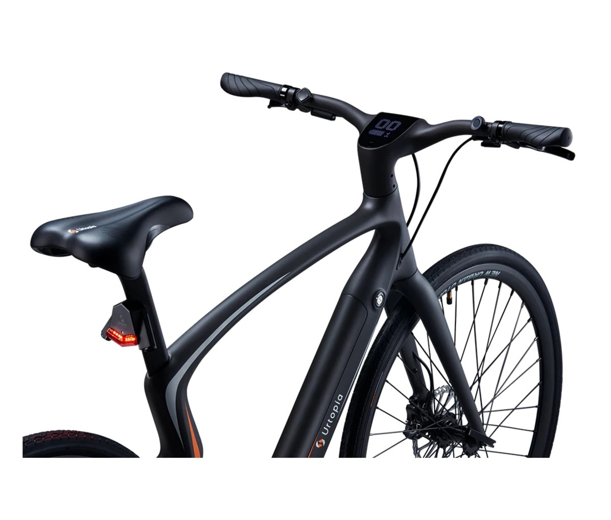 Futuristic carbon fiber e-bike on a white background.