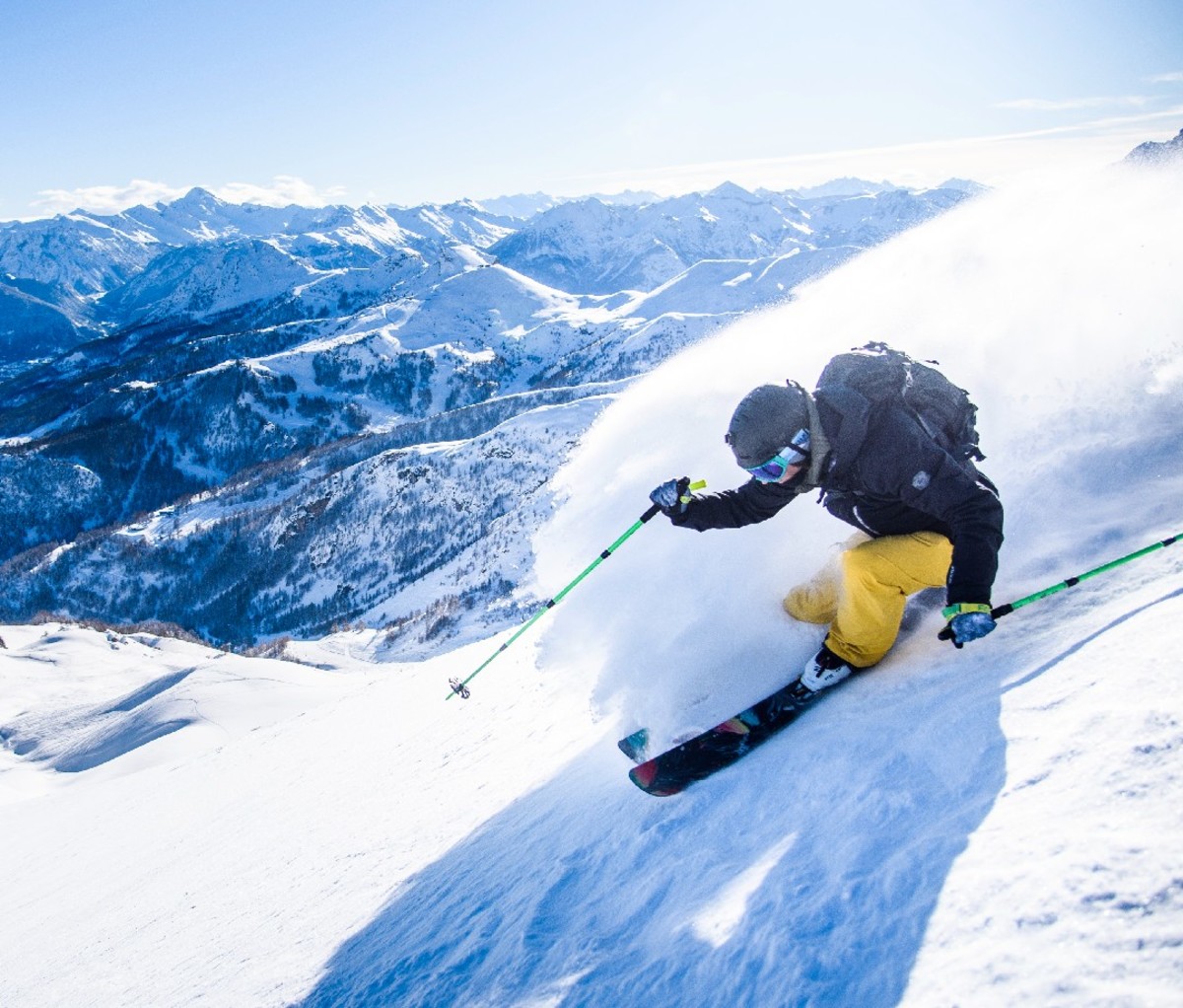 Skier turning on a slope in the alps.