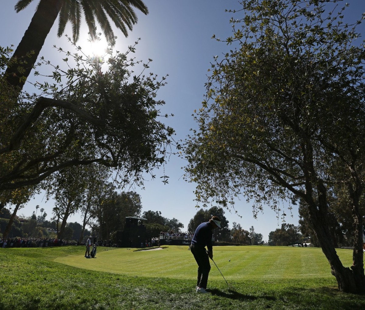Keith Mitchell plays his shot on the tenth hole during the final round of the Genesis Invitational at Riviera Country Club on February 19, 2023