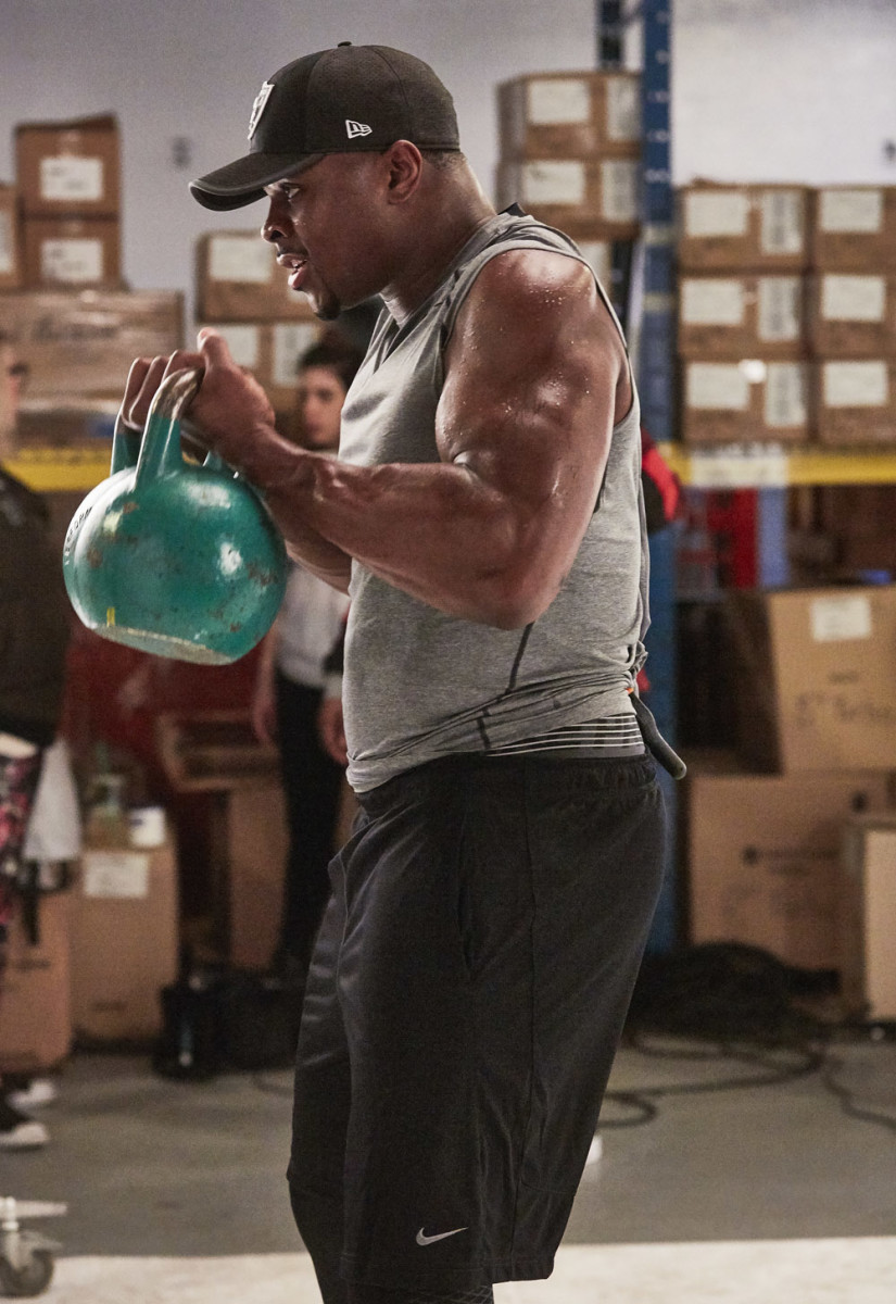 Khalil Mack of Oakland Raiders works out with kettlebell
