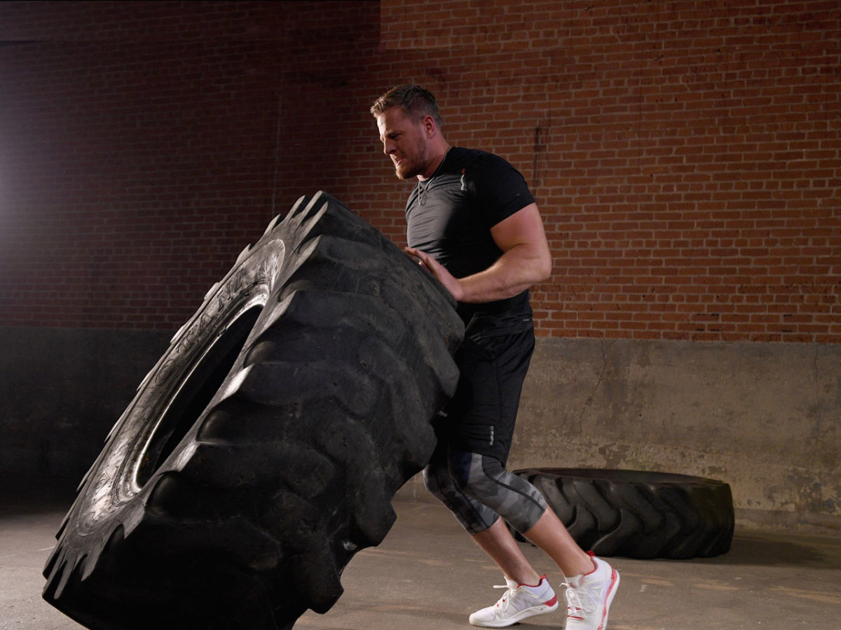 JJ Watt does a workout with a 1,000 pound tire