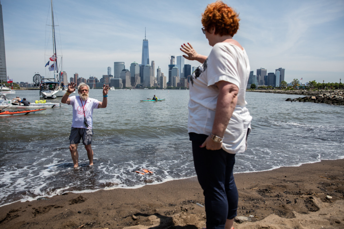 Aleksander 'Olek' Doba says a final goodbye to his wife before departing the Liberty Yacht Club, New Jersey. Olek had to leave at 1:07pm because it was auspicious timing, which sent him straight into maximum ebb. Saturday May 28, 2016. Photo/David Jackson